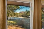 Enjoy red rock views from the comfort of bed